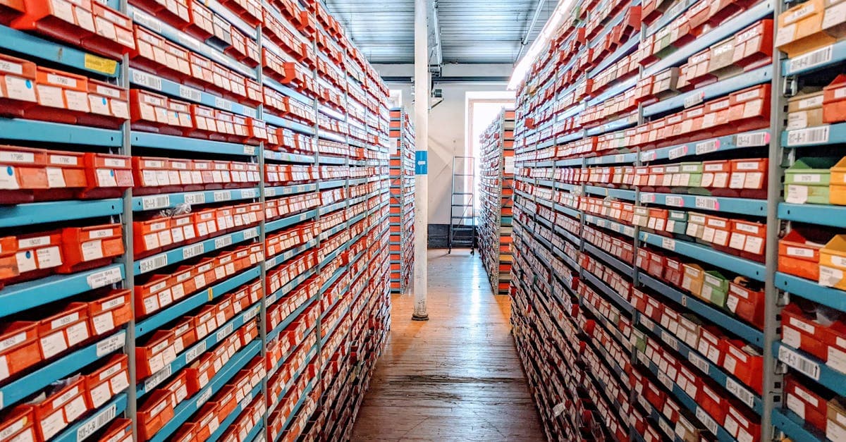 Ecommerce warehouse inventory organized by ABC classification tiers with labeled product shelves