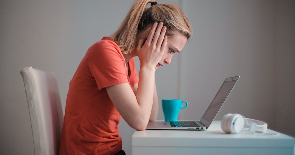 Amazon seller account suspension notice on screen with rejected appeal documents showing automated enforcement without human review