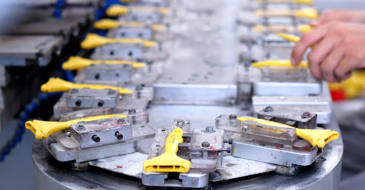 Warehouse table with individual product components laid out next to an assembled bundle kit ready for ecommerce fulfillment