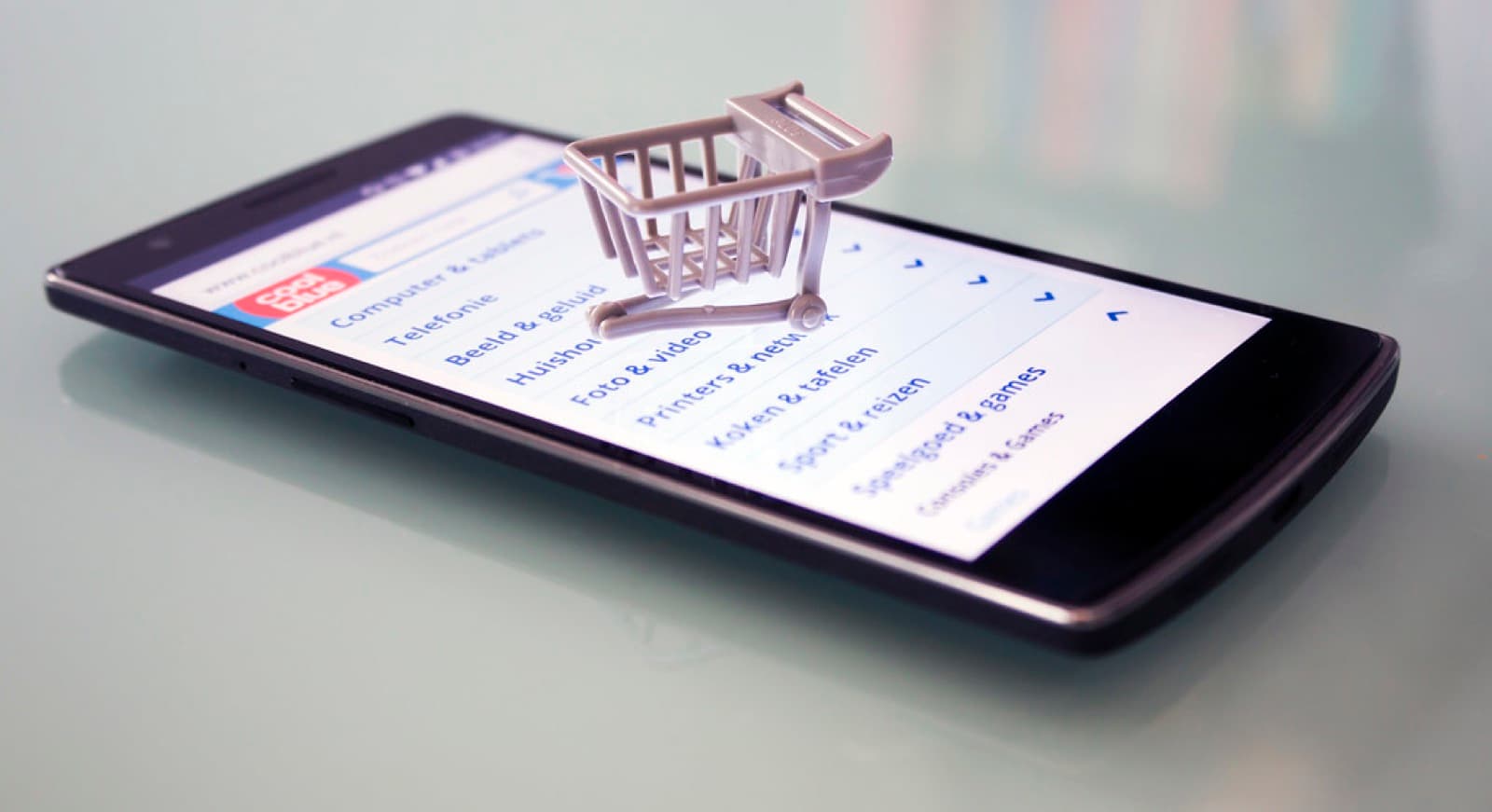 Laptop showing online shopping used for product feed management
